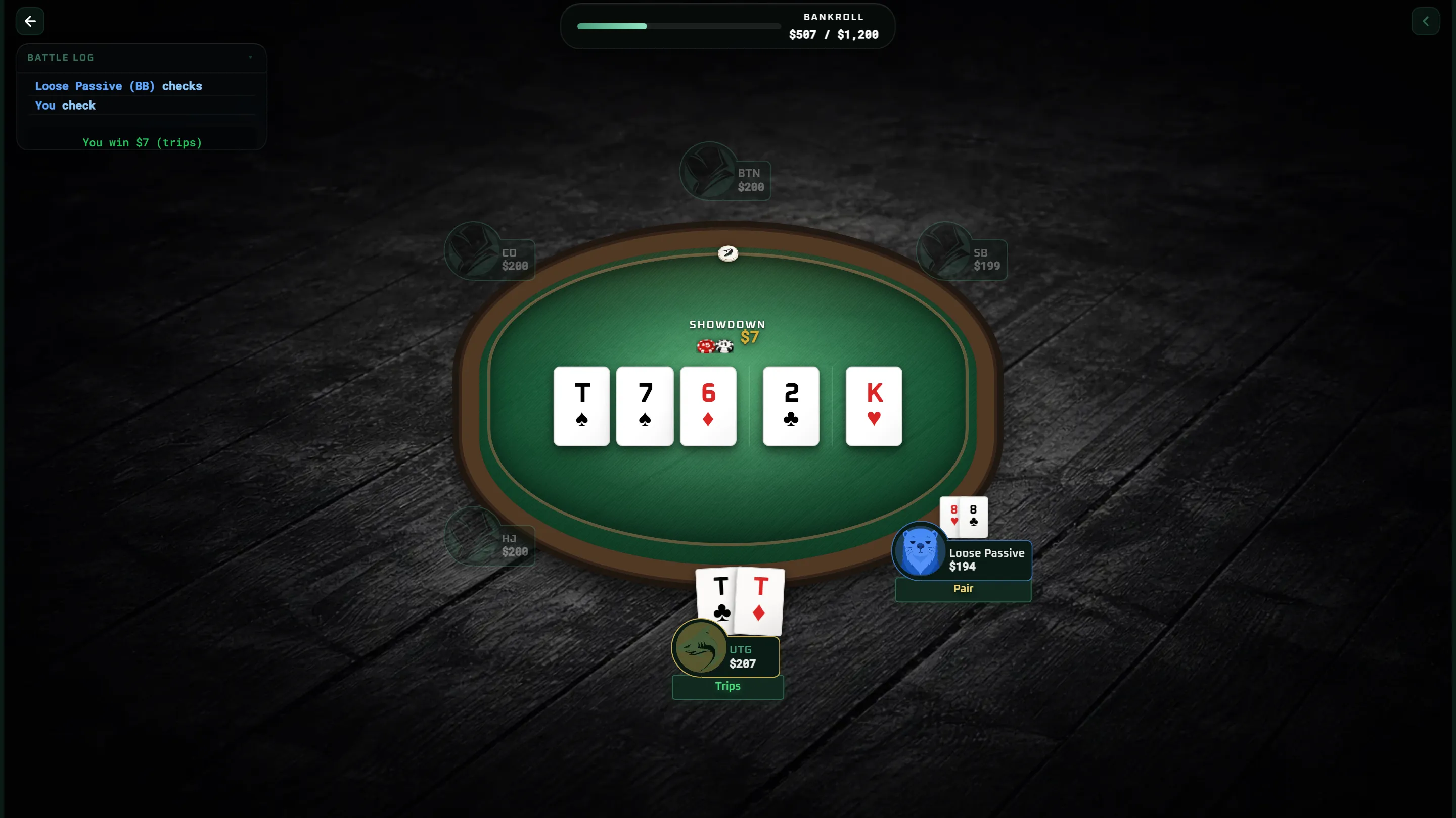 The Arena table at showdown, with both hands turned over and the pot awarded.
